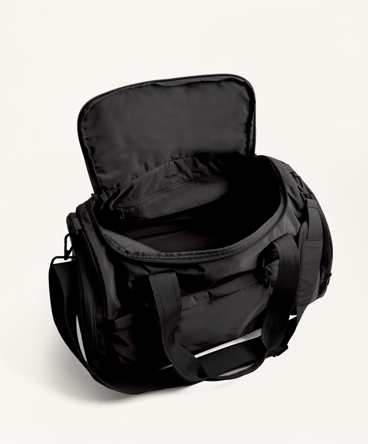 Technical bag with side pockets