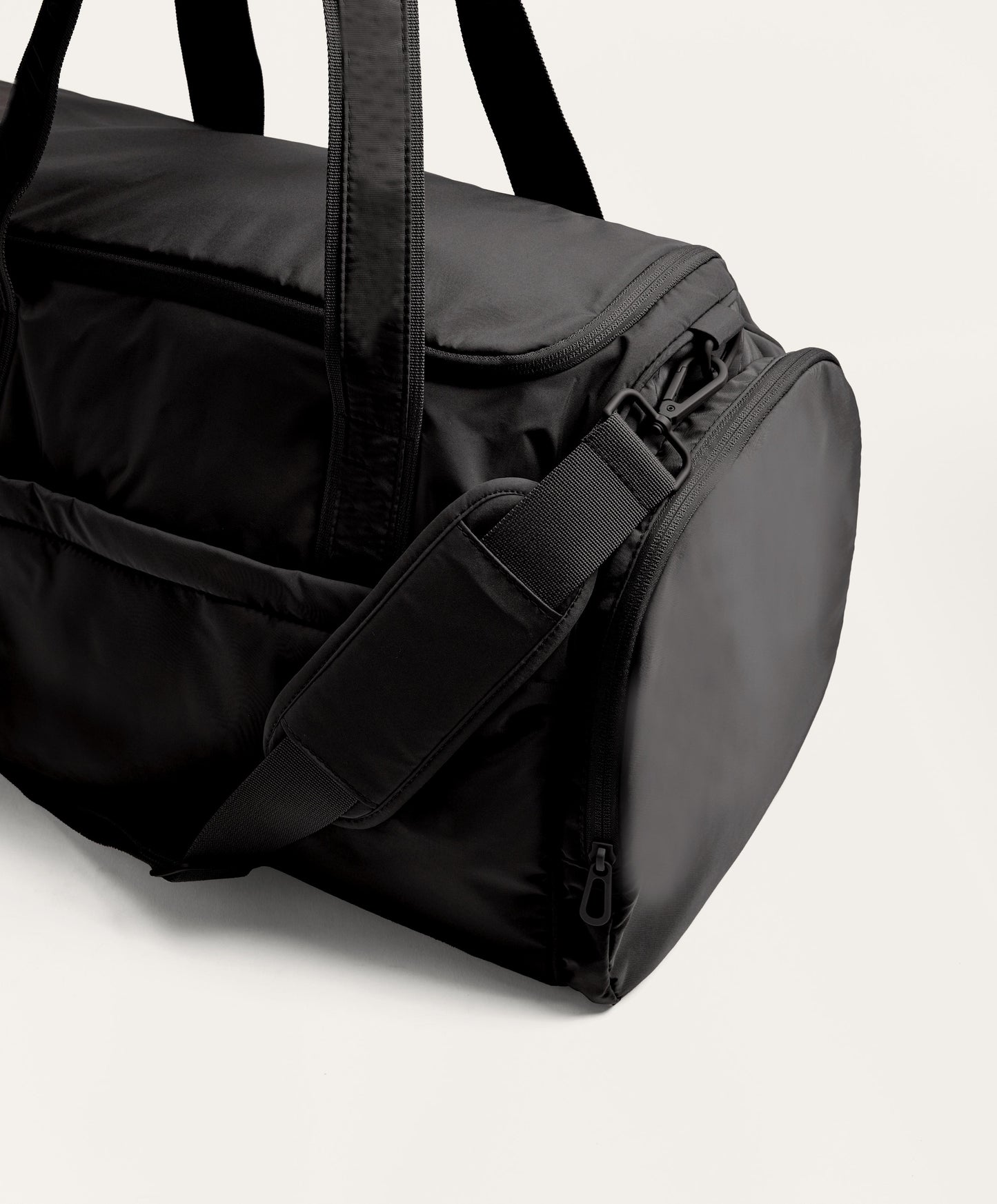 Technical bag with side pockets