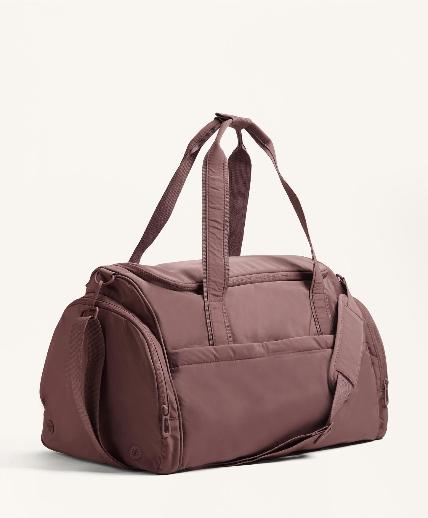 Technical bag with side pockets