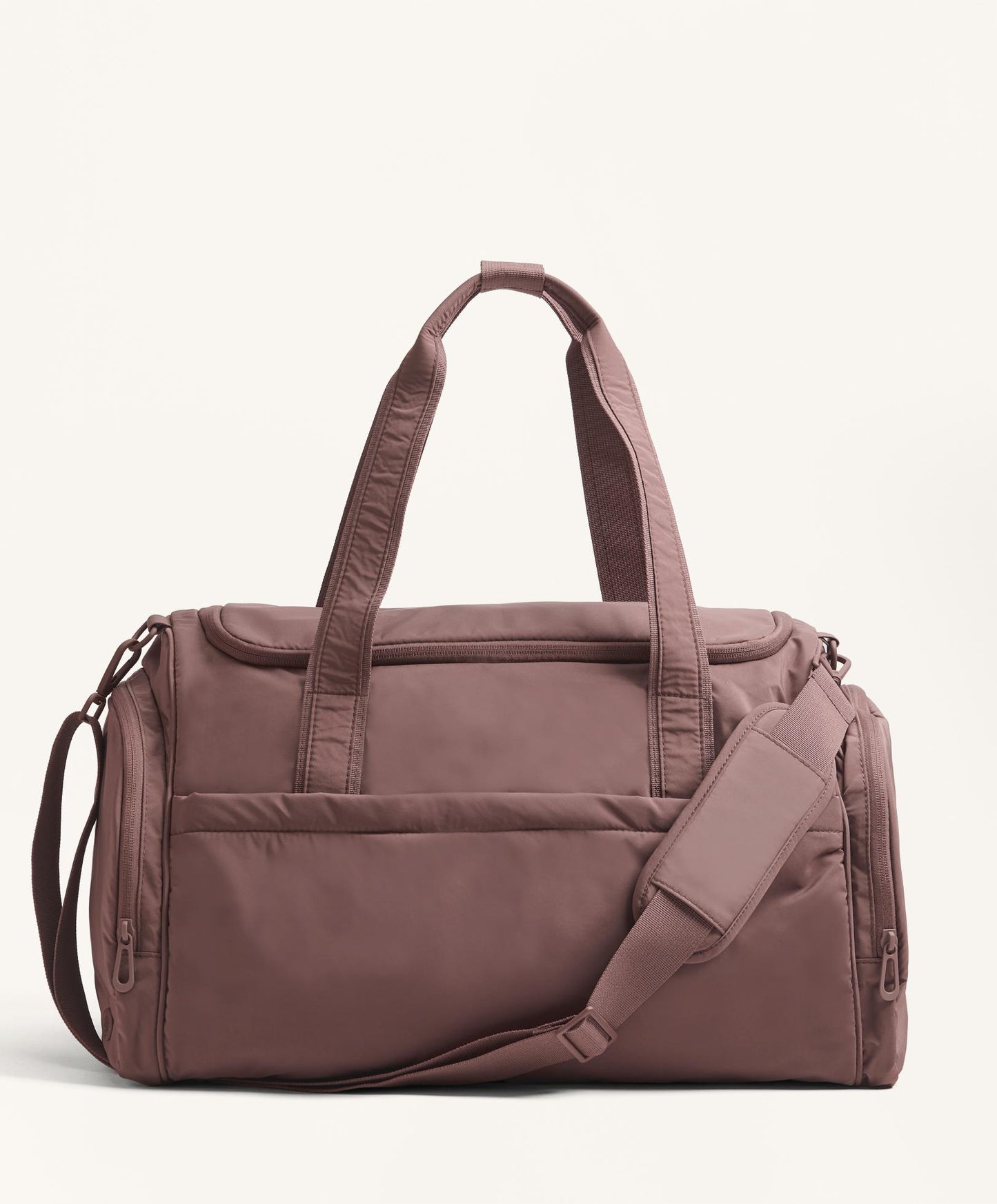 Technical bag with side pockets