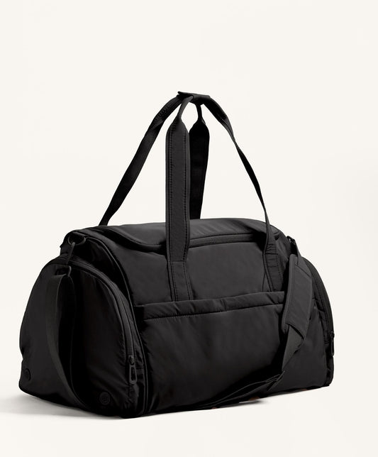 Technical bag with side pockets