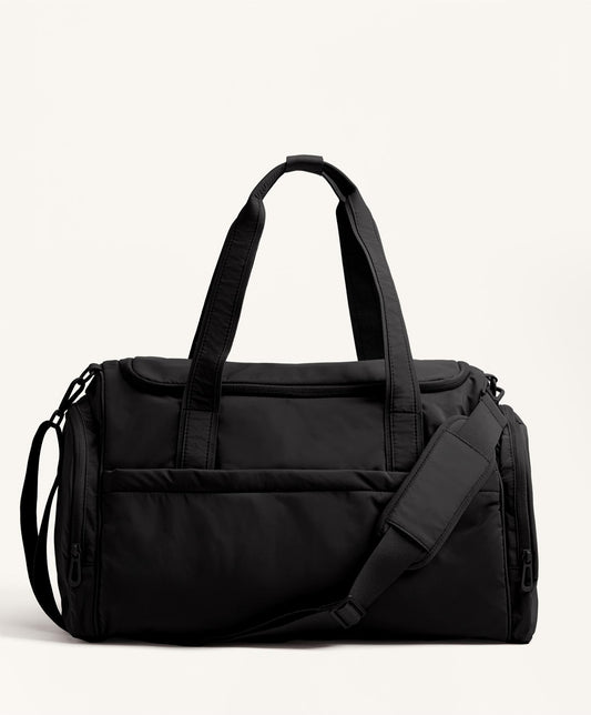 Technical bag with side pockets