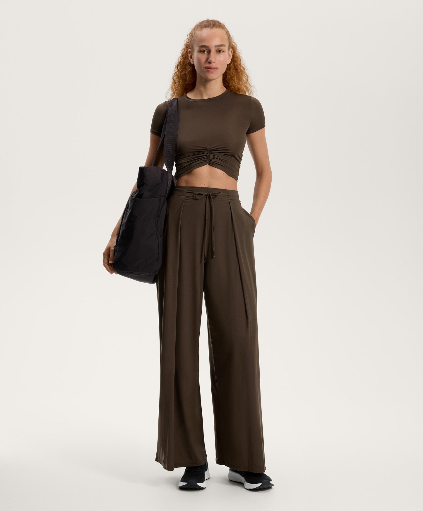 Technical bag with front pocket