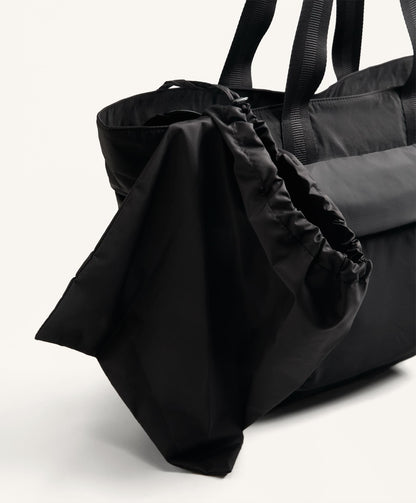 Technical bag with front pocket