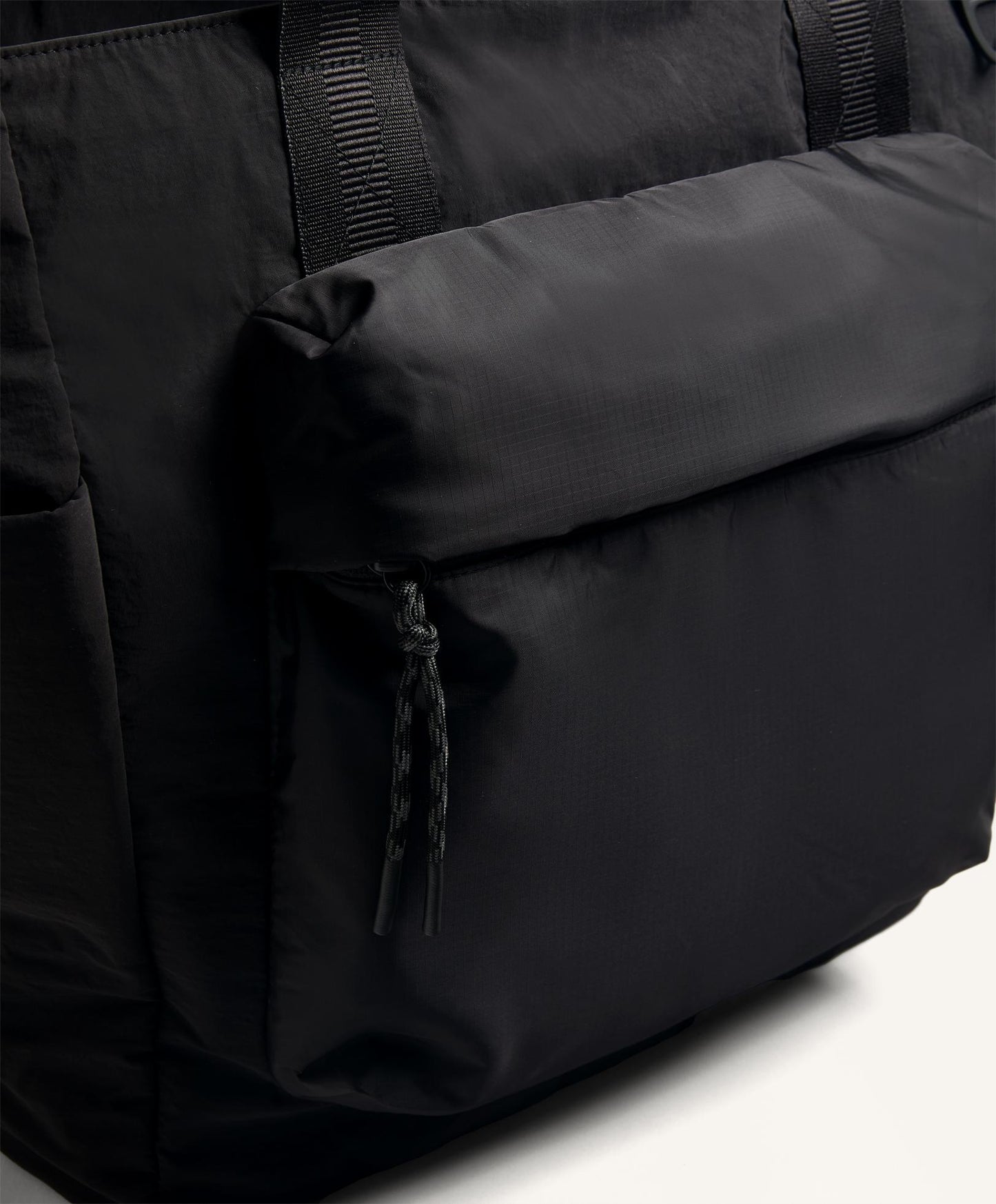 Technical bag with front pocket