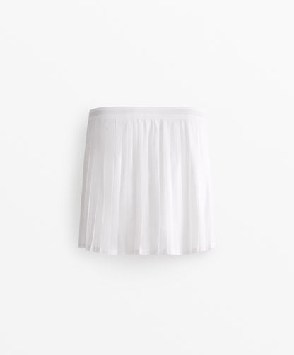 Compressive mesh skirt