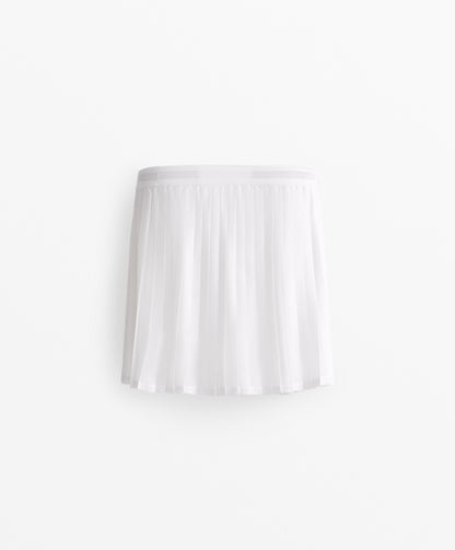 Compressive mesh skirt
