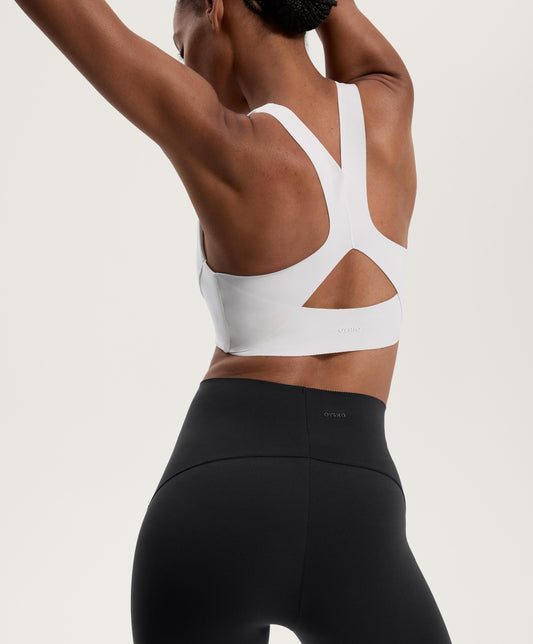 Compressive medium-support bra with cups