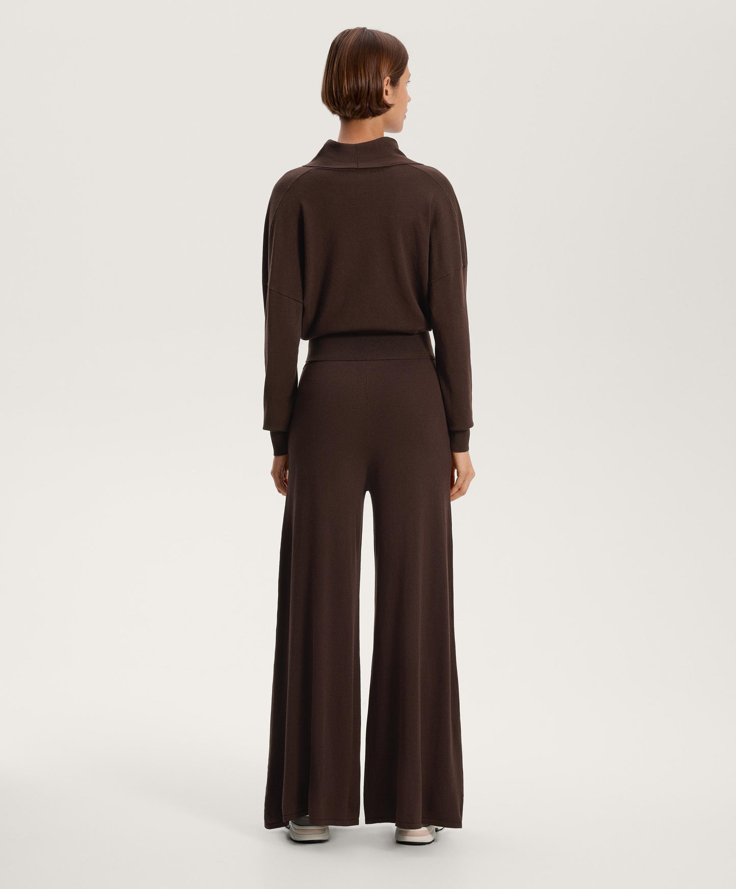 Crossover jumper with fitted waist