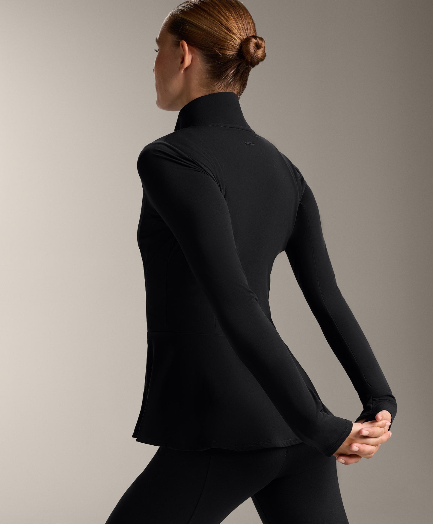 Light warm peplum technical jacket