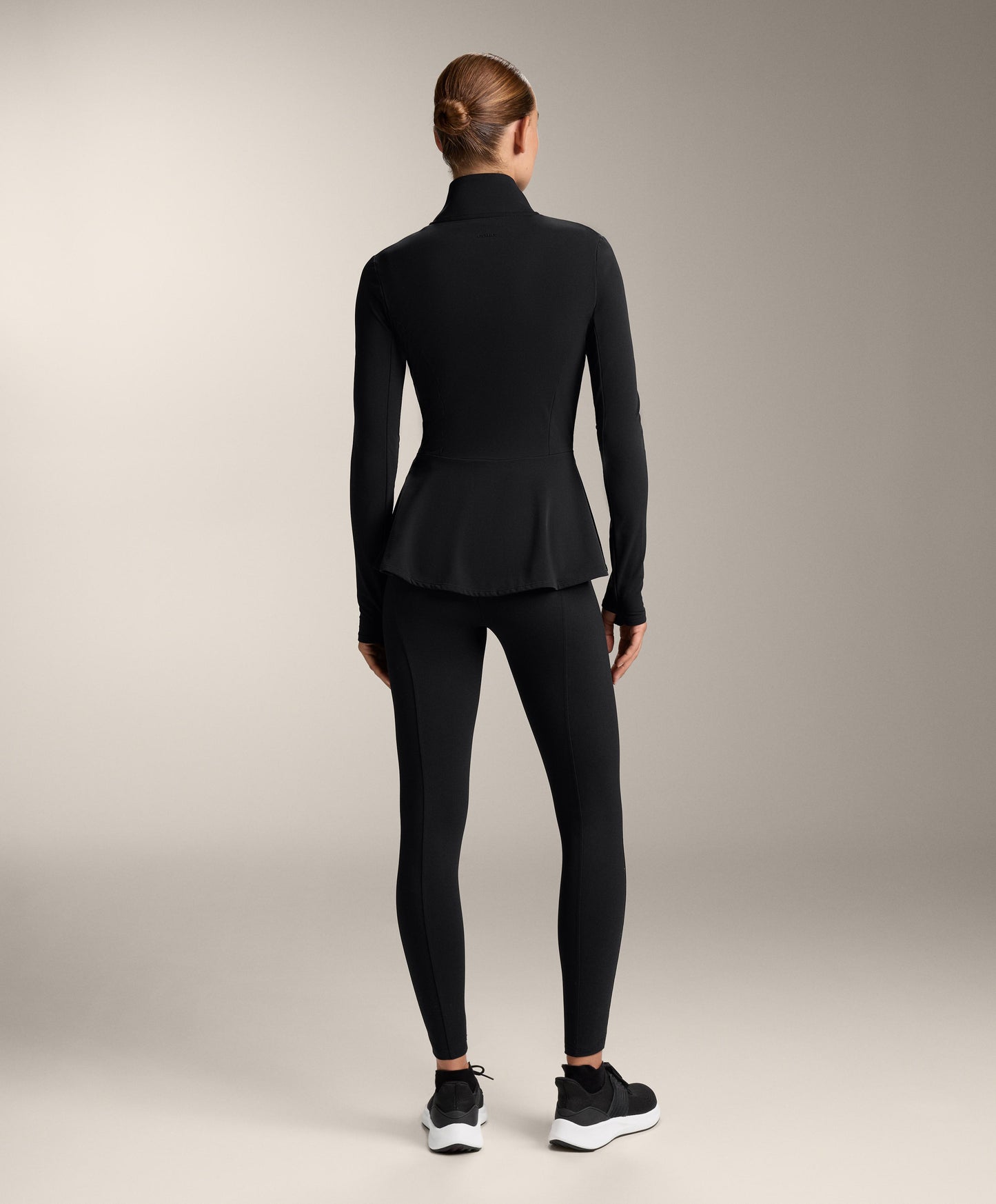 Light warm peplum technical jacket