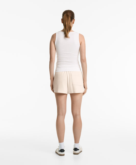 Sleeveless buttoned top with cotton and modal